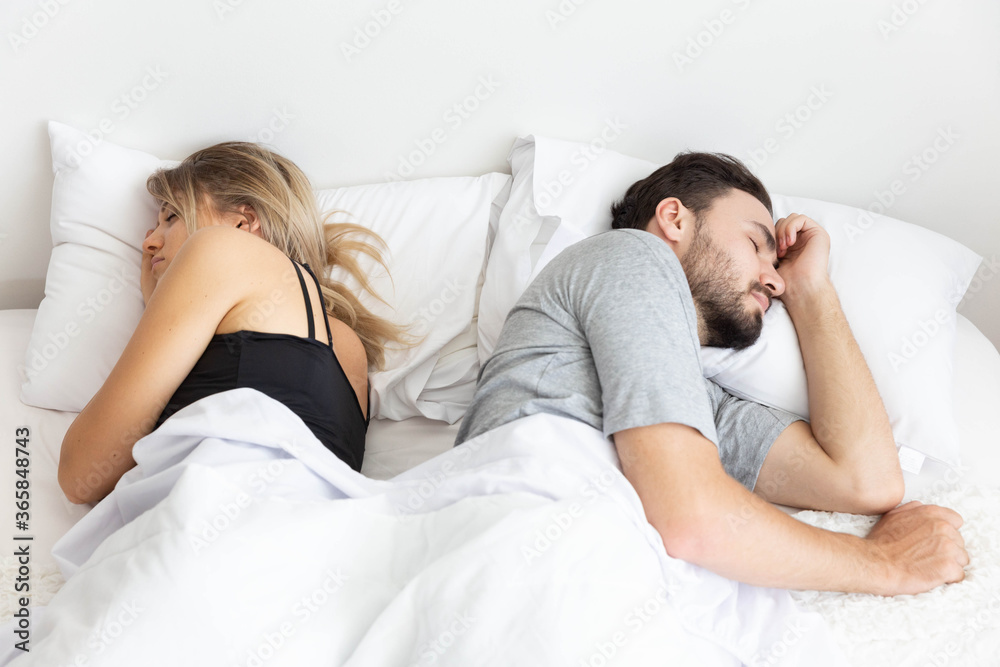 A Couple has problem and sleep by turn back to each other A Couple has problem and sleep by turn back to each other