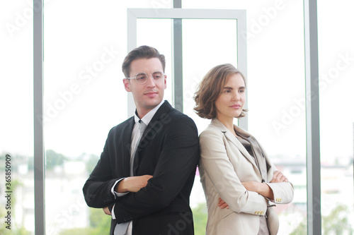 Portrait for Successful businessman and businesswoman meeting for partnership in modern office