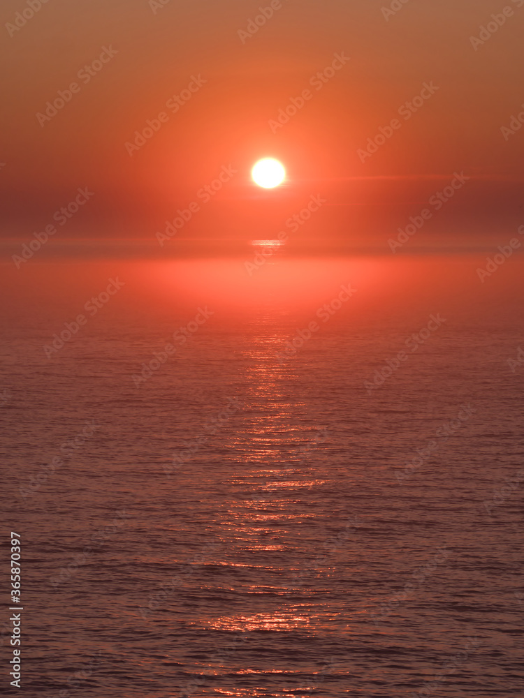 Orange red sunset over the sea