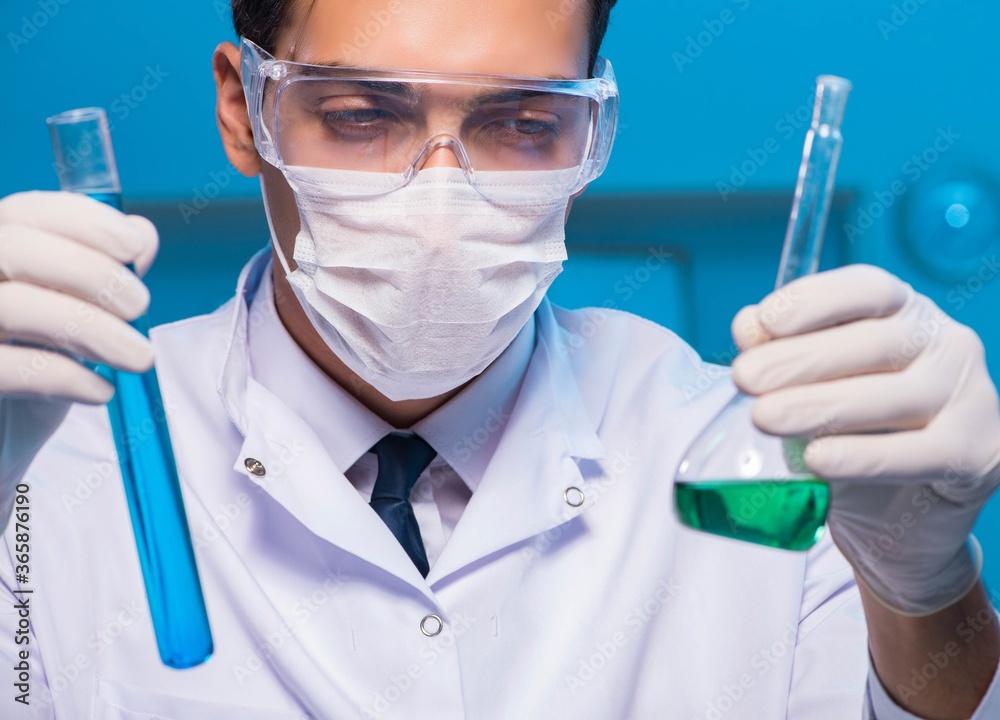 Chemistry assistant working in the chemical lab Chemistry assistant working in the chemical lab