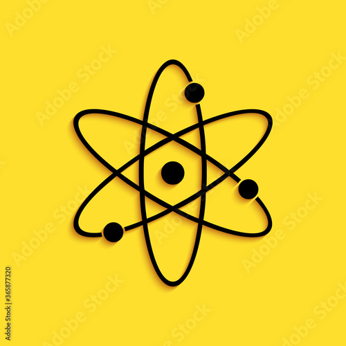 Black Atom icon isolated on yellow background. Symbol of science, education, nuclear physics, scientific research. Electrons and protonssign. Long shadow style. Vector.