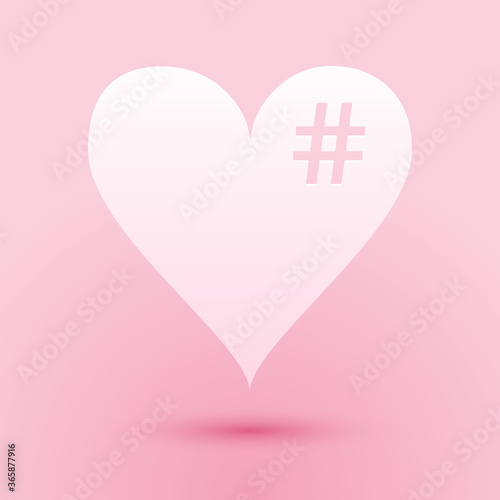 Paper cut The hash love icon. Hashtag heart symbol icon isolated on pink background. Paper art style. Vector.