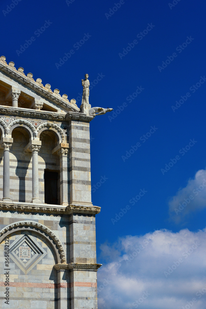 Pisa Cathedral romanesque facade detail, completed in the 12th century (with copy space)