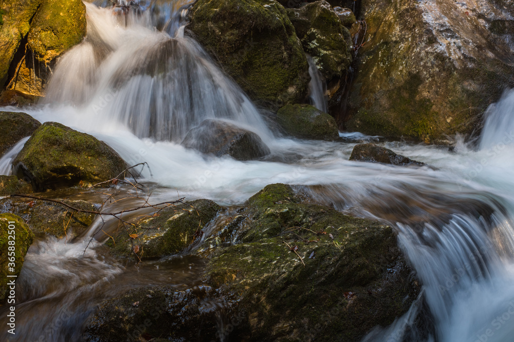 Obraz premium waterfall with basin and rocks