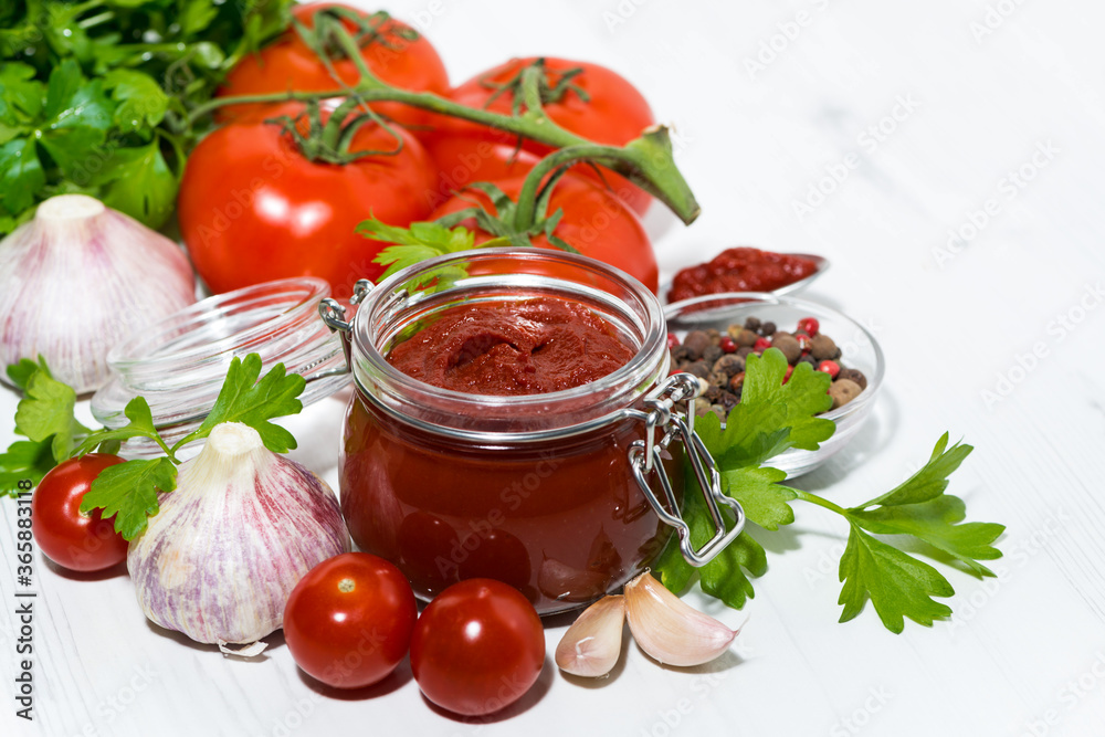 fresh tomato sauce and ingredients on white background, horizontal fresh tomato sauce and ingredients on white background, horizontal