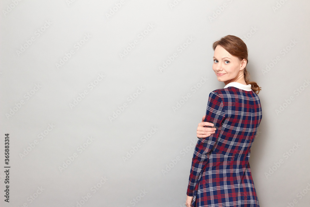 Portrait of happy girl turning around and smiling joyfully Portrait of happy girl turning around and smiling joyfully