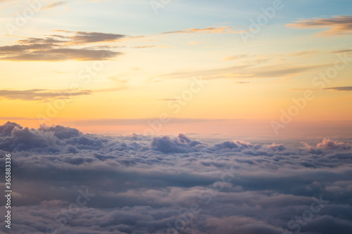 View at sunrise with puffy foggy. White puffy like cloud stretching to foggy horizon in the bright morning. Phu Thap Boek, Phetchabun, Thailand. © Axl4Real
