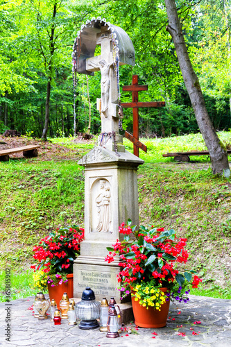 WYSOWA, POLAND - AUGUST 15, 2017: Wayside shrine on the side of the road in Wysowa, Poland. Wysowa is a town located in the heart of Beskid Niski Mountains