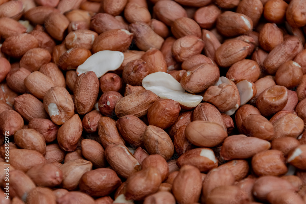 Close up of fried peanuts. Cooking process. Close up of fried peanuts. Cooking process.