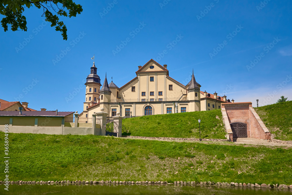 Nesvizh castle in summer day with blue sky. Tourism landmark in Belarus, cultural monument