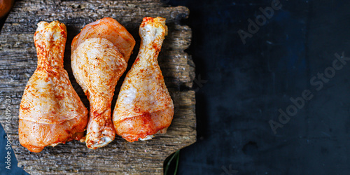 raw chicken legs marinade paprika barbecue grilled meat poultry second course food background top view copy space for text organic eating healthy keto or paleo pescetarian diet photo