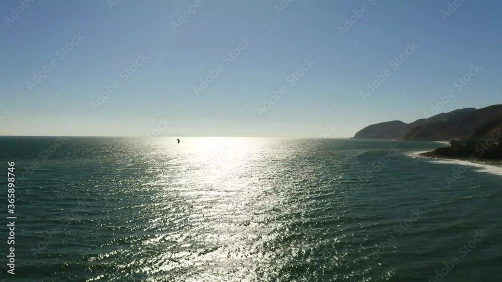 Kite Surfer in Ocean Sunset Horizon Drone Kite Surfer in Ocean Sunset Horizon Drone