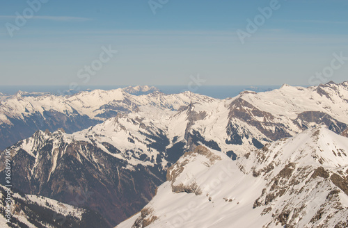 Beautiful panoramic view of snow-capped mountains in the Swiss Alps. © Racoonbtc