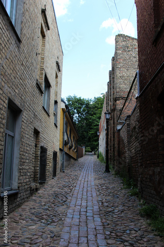 The narrow passage that goes up.  Street of the quiet center of Riga  Latvia.