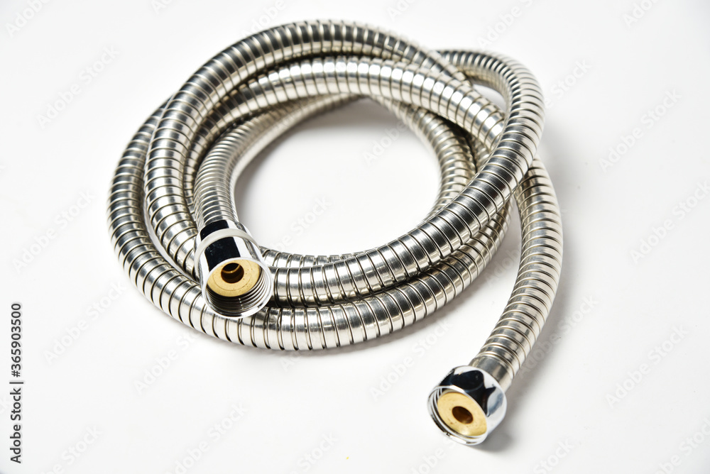 Metal shower hose isolated on white Metal shower hose isolated on white