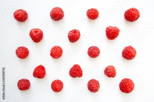 Fresh raspberry pattern isolated on white background from a high angle view