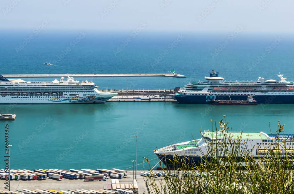 Panoramic view of harbor and marina with cruise ships docked at port in Spain