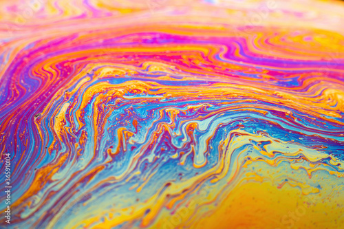 Abstract background texture of iridescent paints. Soap bubble