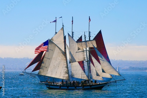 two historic schooner ships and American flag sailing, San Diego, Tall Masted ships, California, United States, USA
