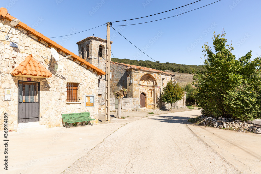 a street in Cubillejo de Lara (Mambrillas de Lara) with the parish church, province of Burgos, Castile and Leon, Spain