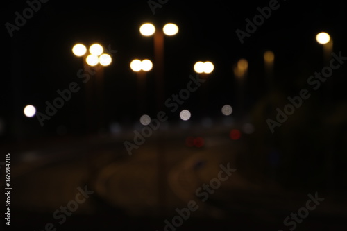 Lanterns at night in an urban environment