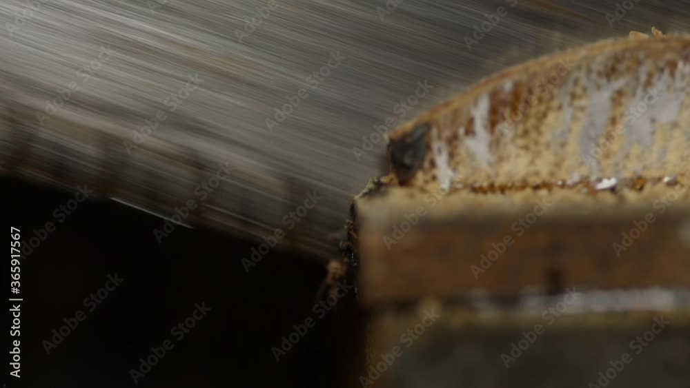 carpenter cutting wood with hand saw macro slow motion carpenter cutting wood with hand saw macro slow motion