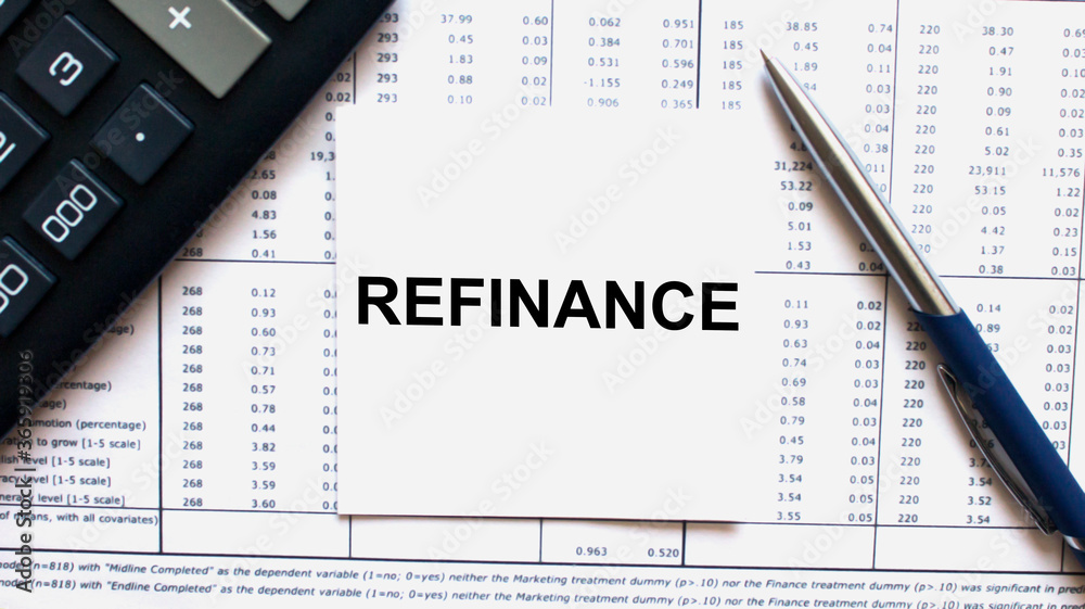 Work smarter text Refinance on white sheet with pen, calculator and tables Work smarter text Refinance on white sheet with pen, calculator and tables