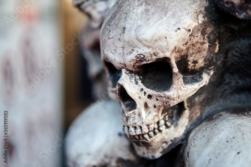 Skull Halloween background Many people skulls stand on top of each other. © Andrii
