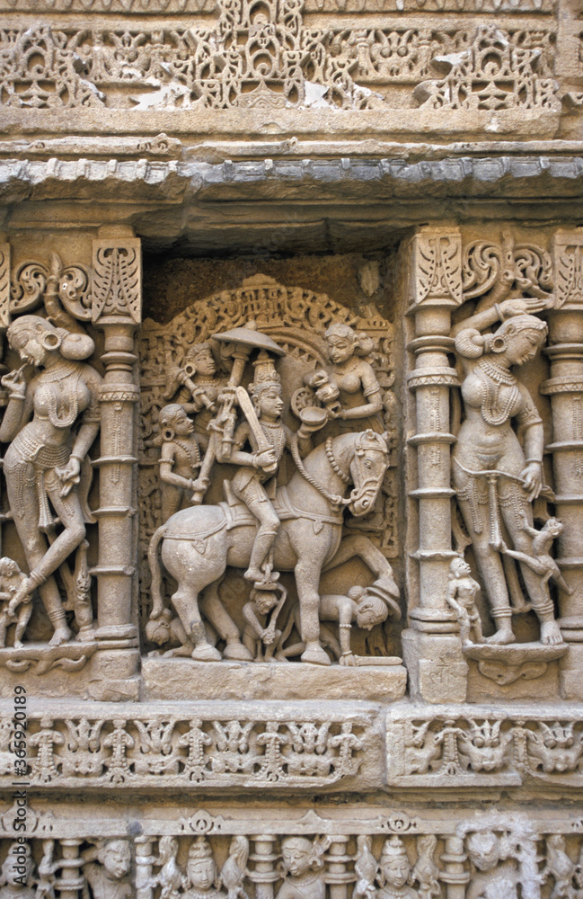 Ornate carvings on wall of Rani-ki-Vav step well, Patan, Gujarat, India