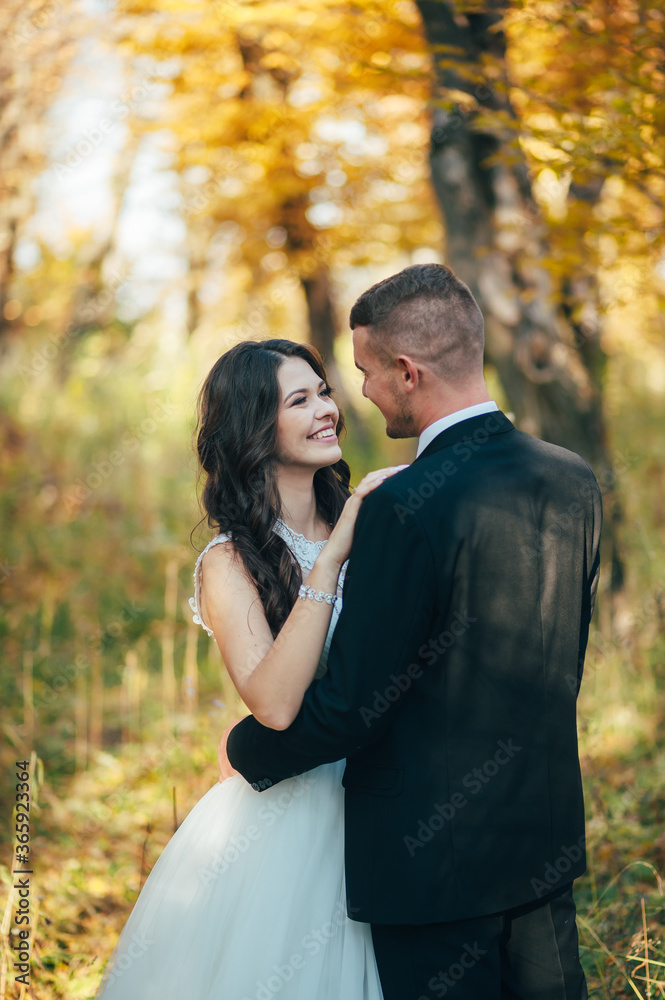 Bride and groom at a photo session in the nature