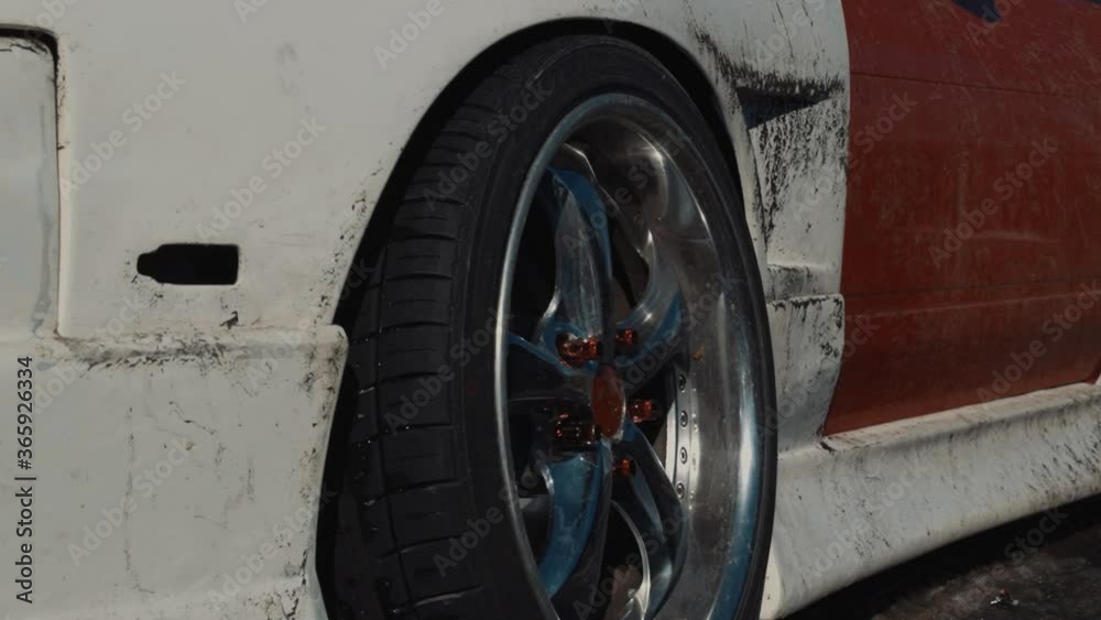 Close Up of a Modified Car Wheel after Drifting in the Snow. Close Up of a Modified Car Wheel after Drifting in the Snow.