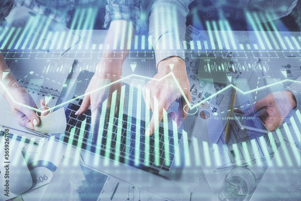 Double exposure of man and woman working together and data theme hologram drawing. Computer background. Top View. Double exposure of man and woman working together and data theme hologram drawing. Computer background. Top View.