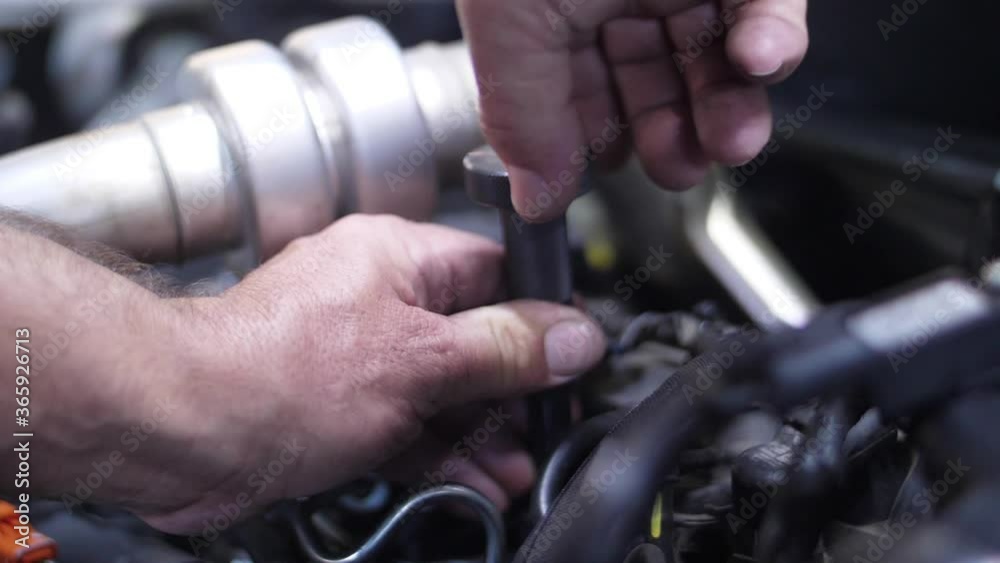 mechanic working on car engine slow motion mechanic working on car engine slow motion