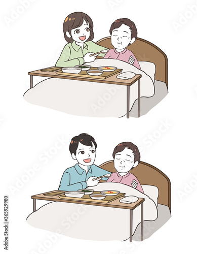老齢女性に食べさせる家族