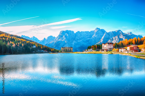 Fototapeta Naklejka Na Ścianę i Meble -  Fantastic sunny view of famous Misurina lake during autumn period