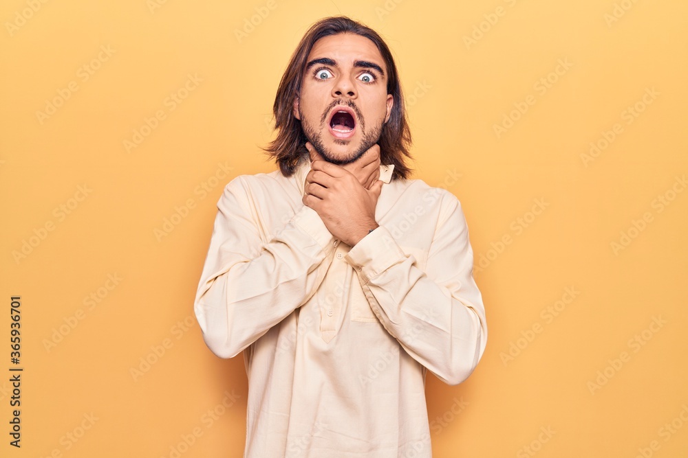 Young handsome man wearing business clothes shouting and suffocate because painful strangle. health problem. asphyxiate and suicide concept. Young handsome man wearing business clothes shouting and suffocate because painful strangle. health problem. asphyxiate and suicide concept.