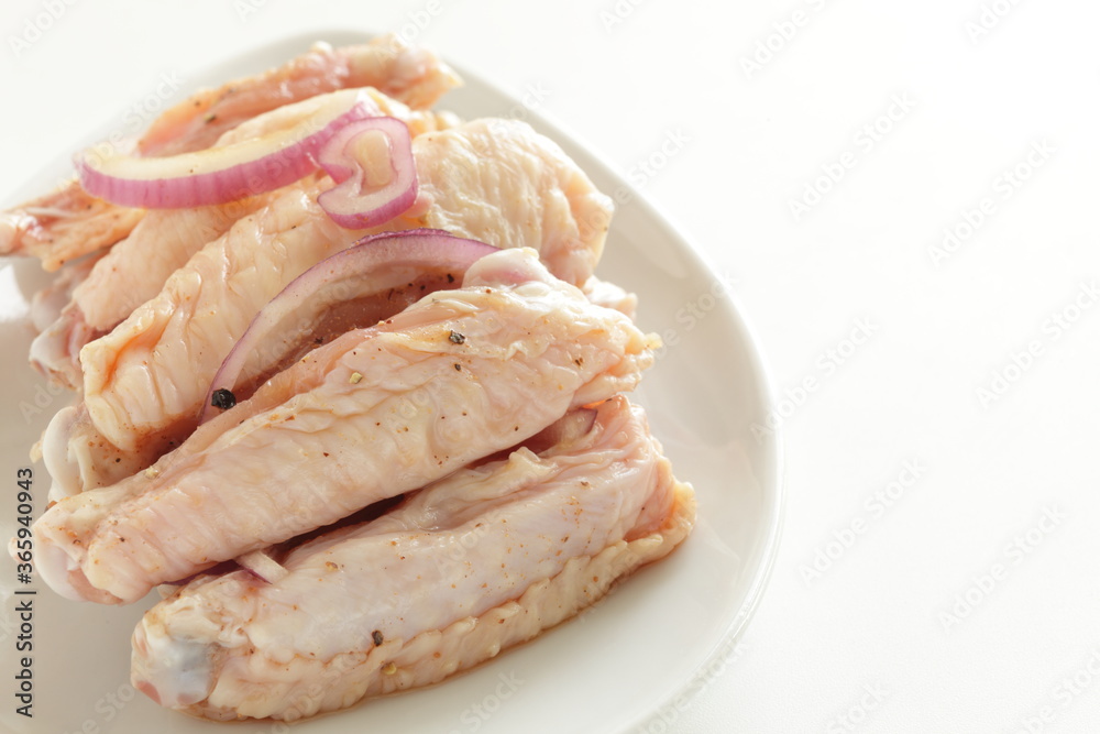 Asian cooking, chicken wing and soy sauce with onion marinated Asian cooking, chicken wing and soy sauce with onion marinated