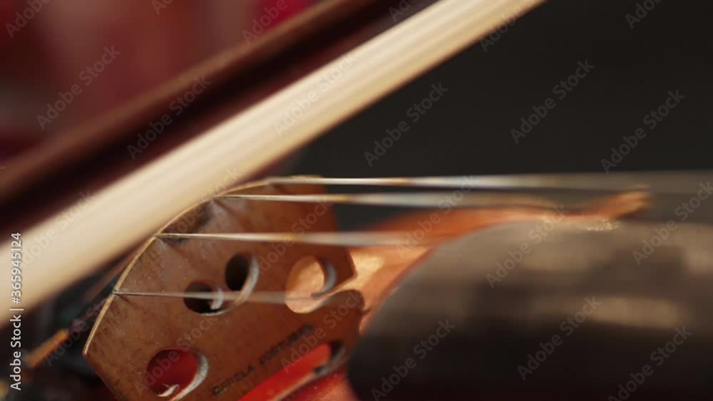 Violinist playing the violin in orchestra slow motion Violinist playing the violin in orchestra slow motion