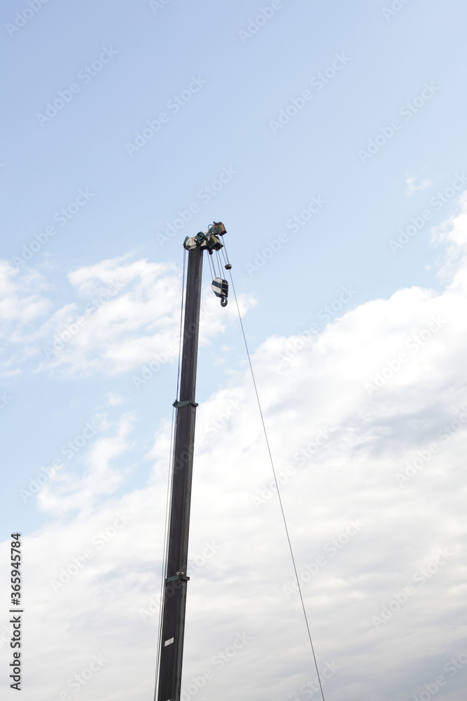 Crane for construction tool on blue sky with copy space Crane for construction tool on blue sky with copy space