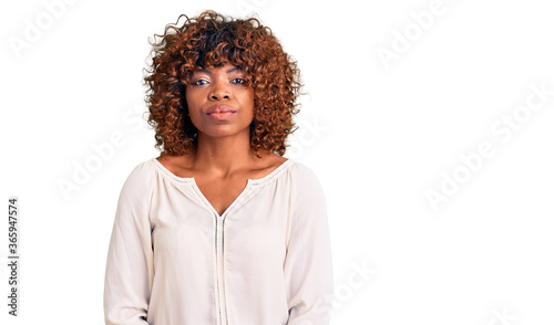Εκτύπωση καμβά Young african american woman wearing casual clothes with serious expression on face