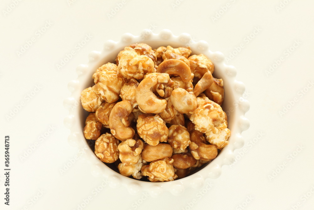 nut and caramel popcorn in bowl for snack food nut and caramel popcorn in bowl for snack food