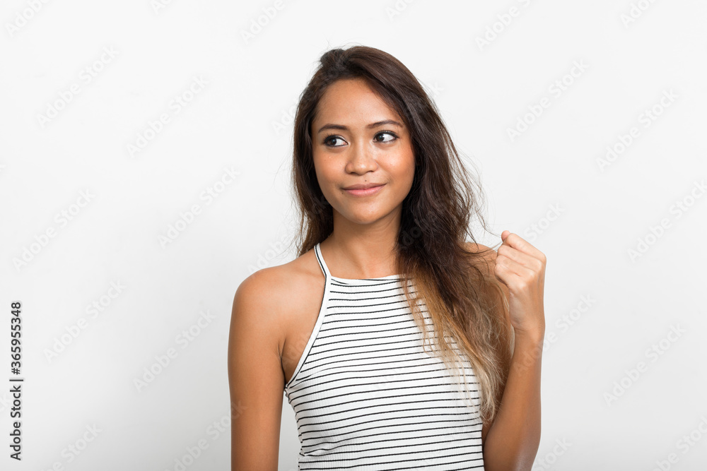 Portrait of young beautiful Asian woman with brown hair Portrait of young beautiful Asian woman with brown hair