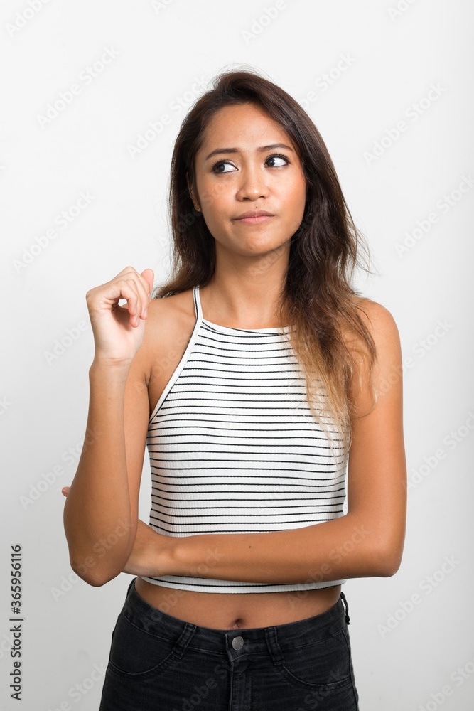 Portrait of young beautiful Asian woman with brown hair Portrait of young beautiful Asian woman with brown hair