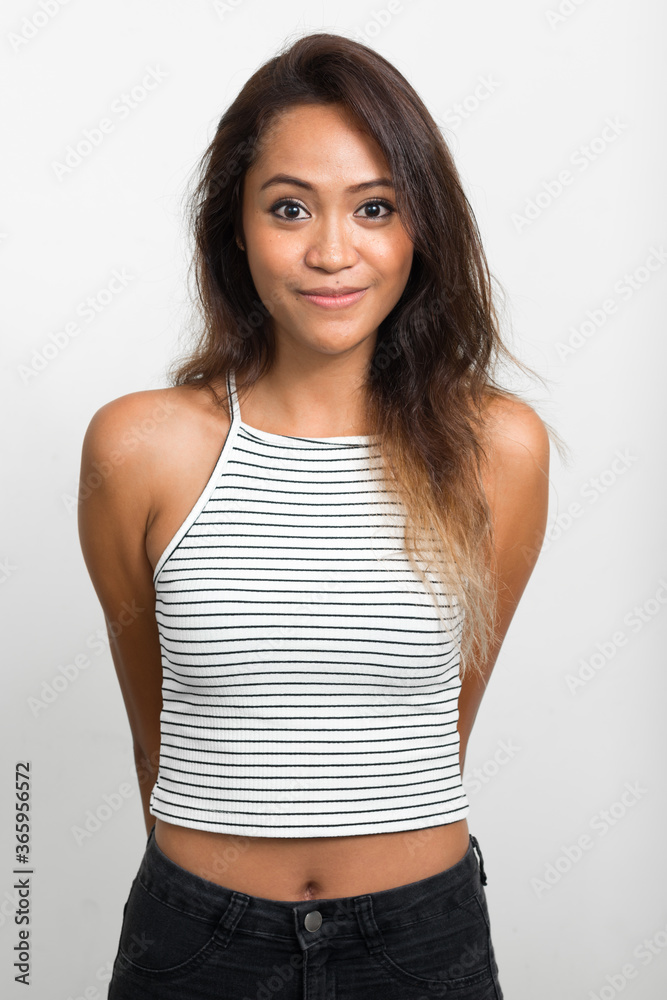 Portrait of young beautiful Asian woman with brown hair Portrait of young beautiful Asian woman with brown hair
