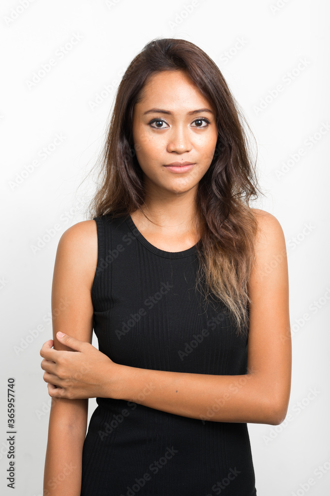 Portrait of young beautiful Asian woman with brown hair Portrait of young beautiful Asian woman with brown hair