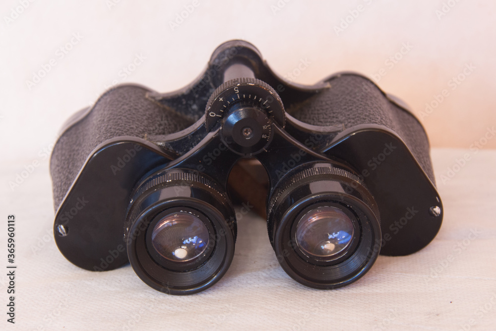 old binocular on a white background. old binocular on a white background.