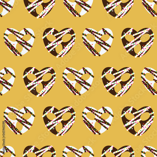 chocolate covered simple pretzel seamless pattern on yellow background design