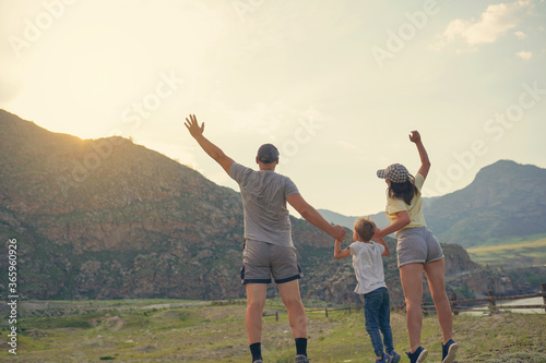 happy family having fun in the mountains