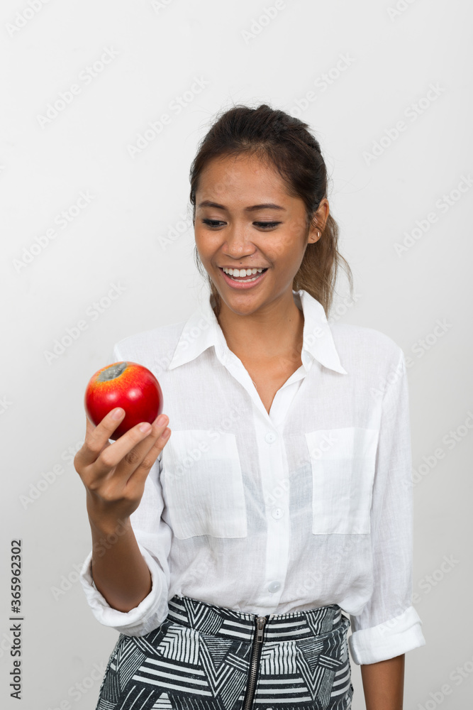Happy young beautiful Asian businesswoman with brown hair Happy young beautiful Asian businesswoman with brown hair