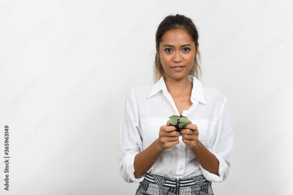 Portrait of young beautiful Asian businesswoman with brown hair Portrait of young beautiful Asian businesswoman with brown hair